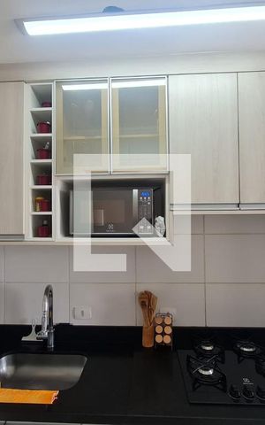 Apartamento à venda com 47m², 2 quartos e 1 vaga Apartamento à venda com 47m², 2 quartos e 1 vagaCozinha e Área de Serviço