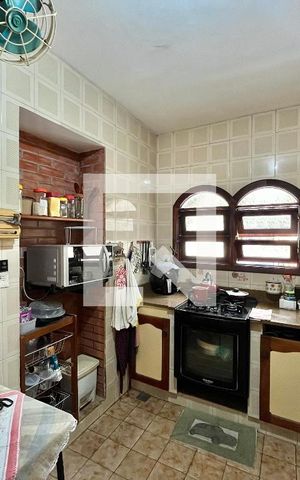 Casa de condomínio à venda com 250m², 3 quartos e 1 vaga Casa de condomínio à venda com 250m², 3 quartos e 1 vagaCozinha