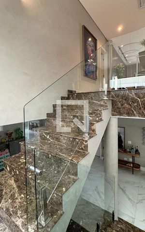 Casa de condomínio à venda com 453m², 3 quartos e 4 vagasEscada