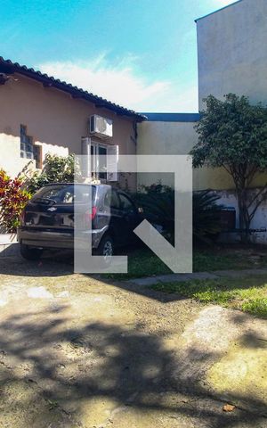 Casa à venda com 163m², 3 quartos e 2 vagas Casa à venda com 163m², 3 quartos e 2 vagasFachada