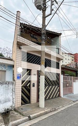 Casa à venda com 232m², 4 quartos e 4 vagasFachada + plaquinha