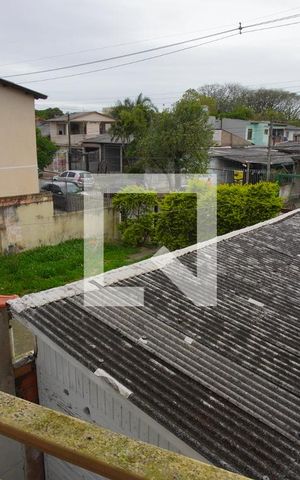 Casa à venda com 180m², 3 quartos e 3 vagasVaranda segundo andar - Vista