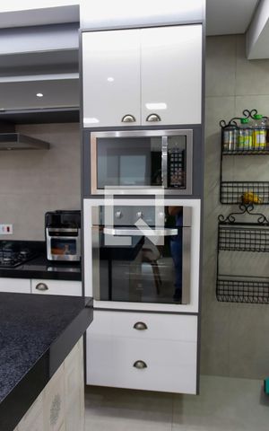 Casa à venda com 130m², 2 quartos e 3 vagas Casa à venda com 130m², 2 quartos e 3 vagasCozinha