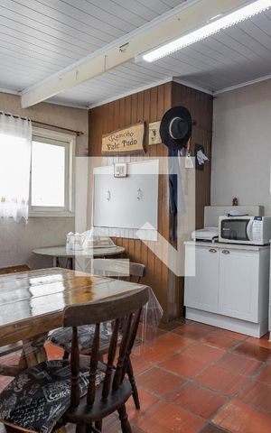Casa à venda com 250m², 3 quartos e 3 vagas Casa à venda com 250m², 3 quartos e 3 vagasCozinha