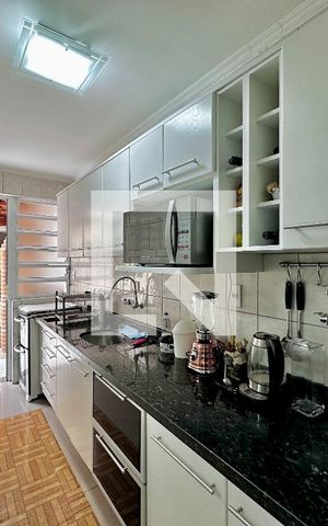 Casa à venda com 105m², 2 quartos e 2 vagas Casa à venda com 105m², 2 quartos e 2 vagasCozinha