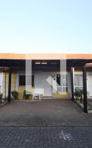 Casa de condomínio à venda com 80m², 2 quartos e 2 vagasFachada da casa