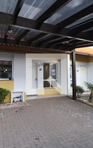 Casa de condomínio à venda com 80m², 2 quartos e 2 vagasFachada da casa