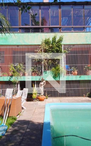 Casa à venda com 520m², 4 quartos e 5 vagasFachada - Fundos da Casa