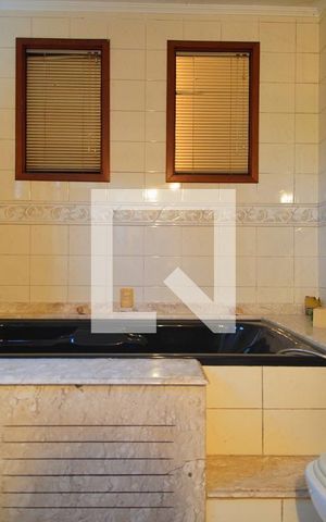 Casa à venda com 520m², 4 quartos e 5 vagasBanheiro da Suíte 2