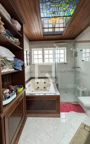 Casa de condomínio à venda com 600m², 4 quartos e 4 vagasBanheiro da Suíte 1