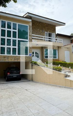 Casa de condomínio à venda com 600m², 4 quartos e 4 vagasFachada