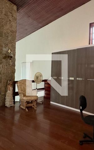 Casa de condomínio à venda com 600m², 4 quartos e 4 vagasSala de TV
