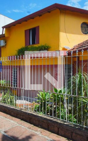 Casa à venda com 300m², 3 quartos e 4 vagasFachada com Placa
