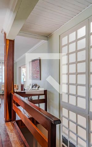 Casa à venda com 409m², 4 quartos e 5 vagas Casa à venda com 409m², 4 quartos e 5 vagasCorredor