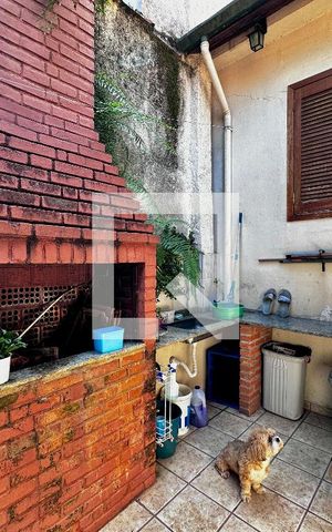 Casa à venda com 290m², 4 quartos e 2 vagas Casa à venda com 290m², 4 quartos e 2 vagasChurrasqueira