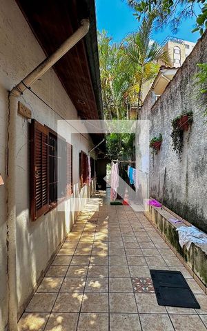 Casa à venda com 290m², 4 quartos e 2 vagas Casa à venda com 290m², 4 quartos e 2 vagasQuintal
