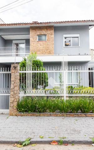 Casa à venda com 340m², 5 quartos e 6 vagas Casa à venda com 340m², 5 quartos e 6 vagasFachada