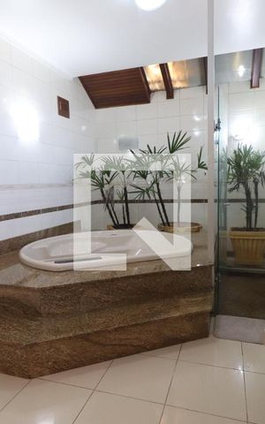 Casa à venda com 572m², 4 quartos e 3 vagasBanheiro da Suíte