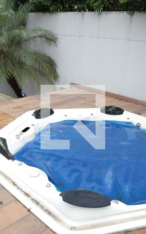 Casa de condomínio para alugar com 590m², 5 quartos e 8 vagasÁrea externa
