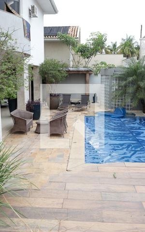 Casa de condomínio para alugar com 590m², 5 quartos e 8 vagasÁrea externa