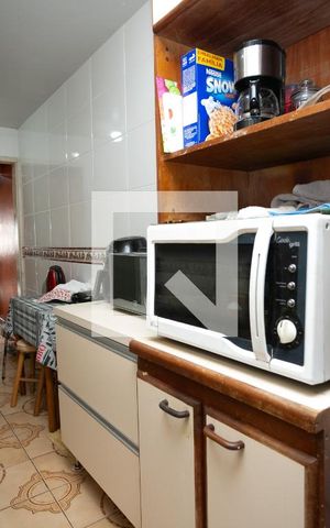 Casa à venda com 100m², 3 quartos e 2 vagas Casa à venda com 100m², 3 quartos e 2 vagasCozinha