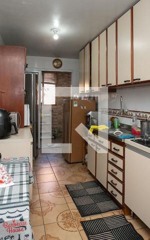 Casa à venda com 100m², 3 quartos e 2 vagas Casa à venda com 100m², 3 quartos e 2 vagasCozinha