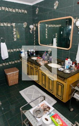 Casa à venda com 1000m², 5 quartos e 7 vagasBanheiro da Suíte 5