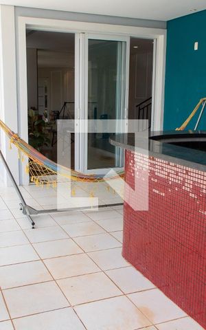 Casa de condomínio para alugar com 520m², 4 quartos e 6 vagasÁrea Gourmet