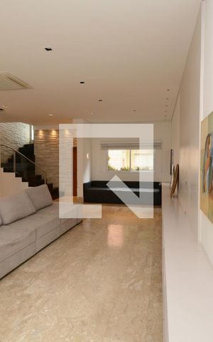 Casa de condomínio à venda com 300m², 4 quartos e 4 vagasSala