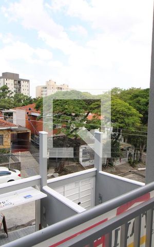 Casa à venda com 105m², 3 quartos e 2 vagasQuarto 3 - Varanda