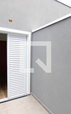 Casa à venda com 105m², 3 quartos e 2 vagasQuarto 1 - Varanda