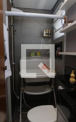 Casa de condomínio à venda com 68m², 2 quartos e 2 vagasBanheiro da Suíte 2