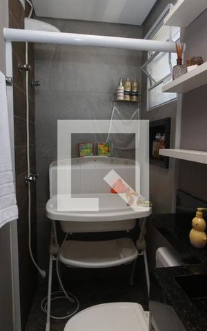 Casa de condomínio à venda com 68m², 2 quartos e 2 vagasBanheiro da Suíte 2
