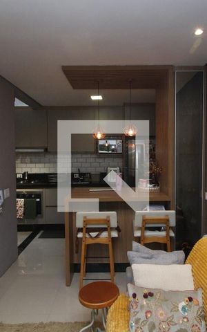 Casa de condomínio à venda com 68m², 2 quartos e 2 vagasSala de TV