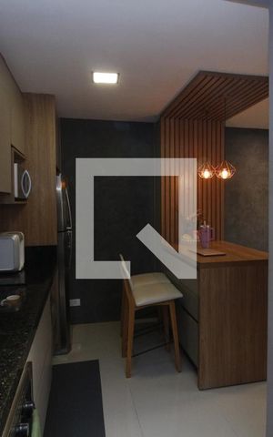 Casa de condomínio à venda com 68m², 2 quartos e 2 vagasCozinha e Área de Serviço