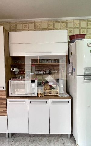 Casa à venda com 122m², 4 quartos e 2 vagas Casa à venda com 122m², 4 quartos e 2 vagasCozinha