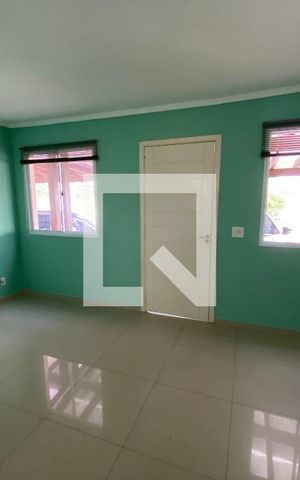 Casa de condomínio à venda com 54m², 3 quartos e 2 vagasSala