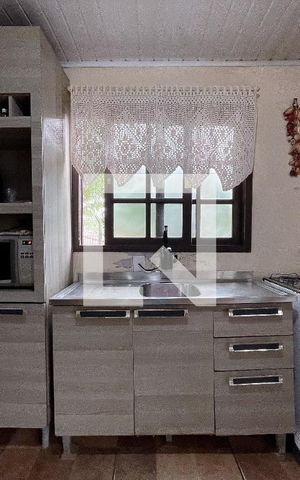 Casa à venda com 200m², 3 quartos e 2 vagas Casa à venda com 200m², 3 quartos e 2 vagasCozinha