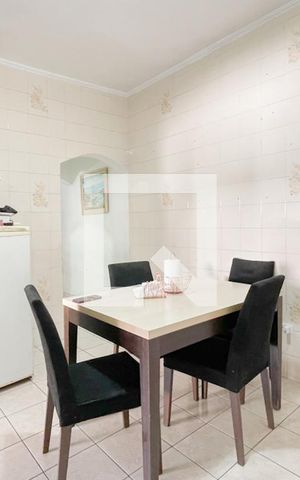 Casa à venda com 125m², 2 quartos e 2 vagas Casa à venda com 125m², 2 quartos e 2 vagasCozinha