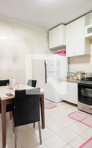 Casa à venda com 125m², 2 quartos e 2 vagas Casa à venda com 125m², 2 quartos e 2 vagasCozinha