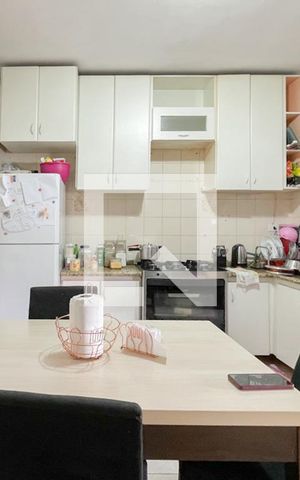 Casa à venda com 125m², 2 quartos e 2 vagas Casa à venda com 125m², 2 quartos e 2 vagasCozinha