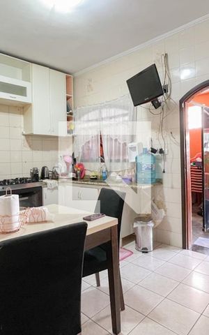 Casa à venda com 125m², 2 quartos e 2 vagas Casa à venda com 125m², 2 quartos e 2 vagasCozinha