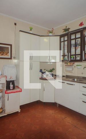 Casa à venda com 200m², 3 quartos e 2 vagas Casa à venda com 200m², 3 quartos e 2 vagasCozinha