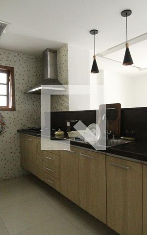 Casa de condomínio à venda com 204m², 4 quartos e 2 vagasCozinha