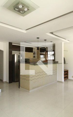 Casa de condomínio à venda com 204m², 4 quartos e 2 vagasSala 1