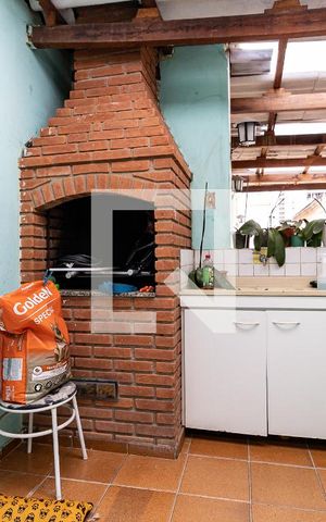 Casa à venda com 250m², 5 quartos e 2 vagas Casa à venda com 250m², 5 quartos e 2 vagasQuintal/Área da Churrasqueira da Casa 2