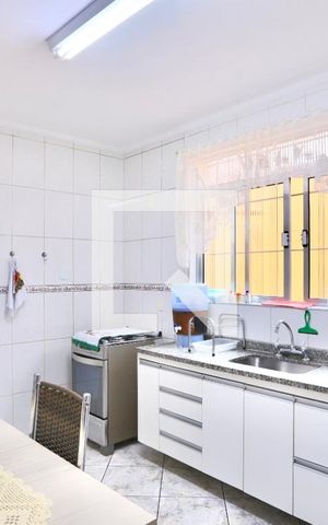 Casa à venda com 120m², 3 quartos e 2 vagas Casa à venda com 120m², 3 quartos e 2 vagasCozinha