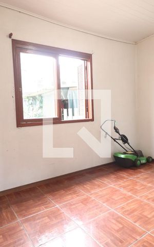 Casa à venda com 219m², 2 quartos e 1 vagaCasa da Frente - Quarto 1