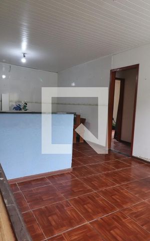 Casa à venda com 219m², 2 quartos e 1 vagaCasa da Frente - Sala e Cozinha