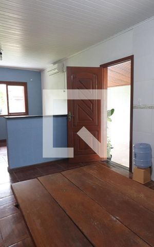 Casa à venda com 219m², 2 quartos e 1 vagaCasa da Frente - Sala e Cozinha